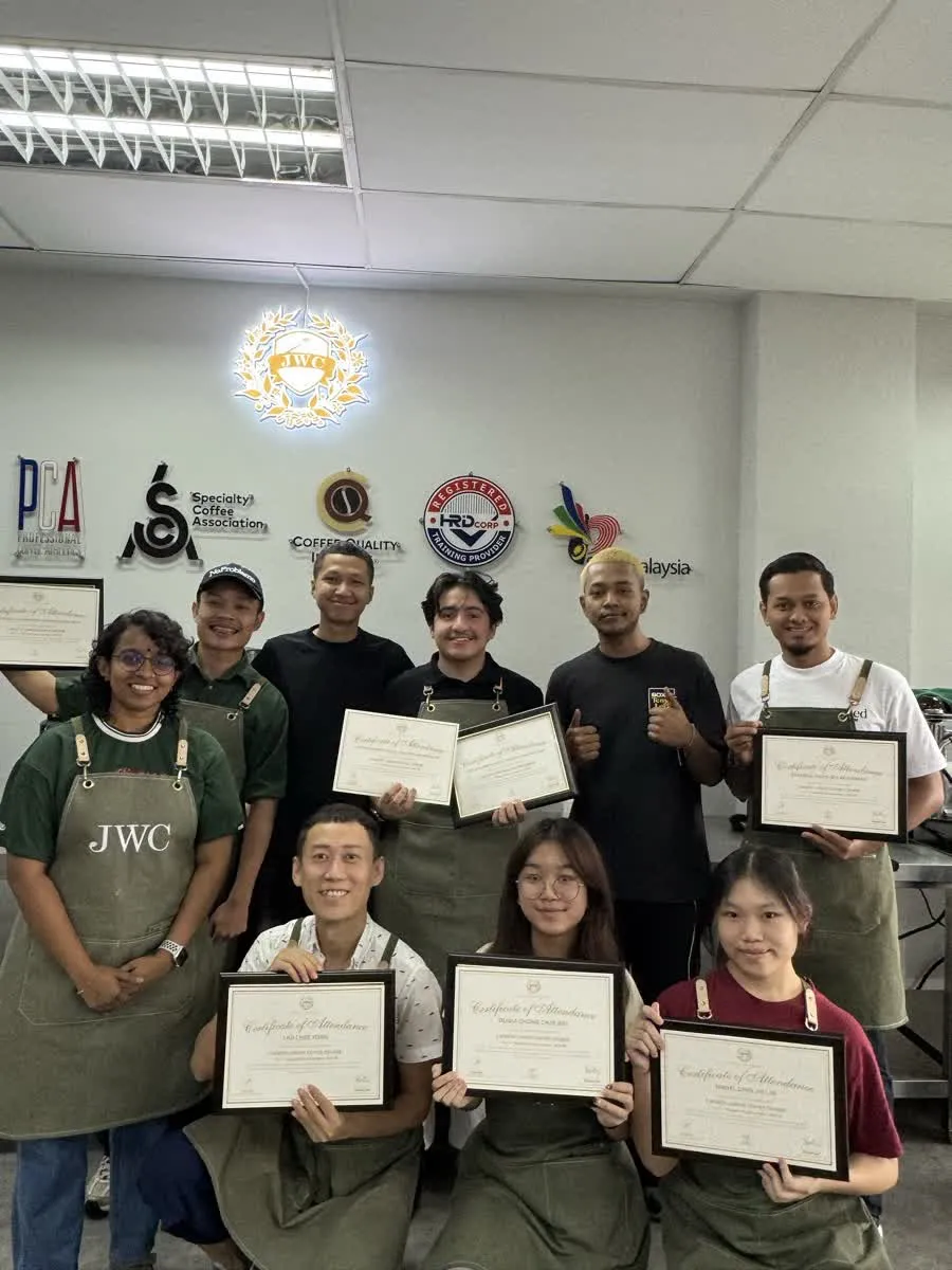 JWC Academy student cohort celebrating coffee course completion