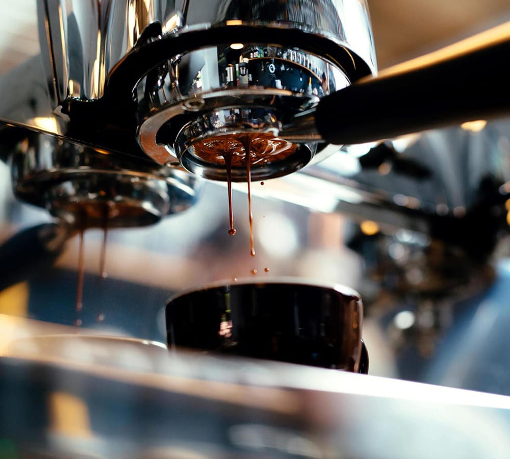 Espresso extraction from a commercial coffee machine